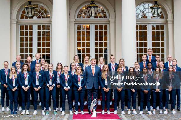 King Willem-Alexander of The Netherlands stands next to Lieke Martens and Shanice van de Sanden and coach Sarina Wiegman as he welcomes the women's...