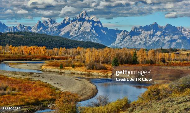 grand teton mountains river view in autumn - wyoming stock pictures, royalty-free photos & images