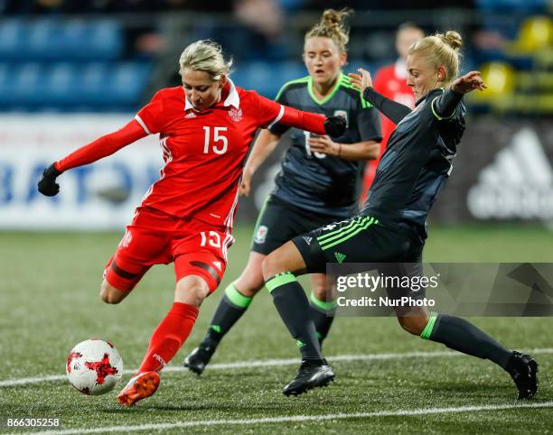Elena Danilova of Russia women's national team and Sophie Ingle of Wales women's national team vie for the ball during the FIFA Women's World Cup...