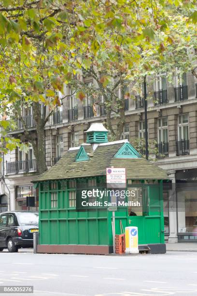 Cabmans shelters along Thurloe Place on 19th October 2015 in London, United Kingdom. Established in 1875, today they provide shelter, hot food and...
