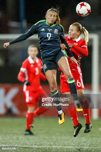 Marina Fedorova of Russia women's national team and Kayleigh Green of Wales women's national team vie for a header during the FIFA Women's World Cup...