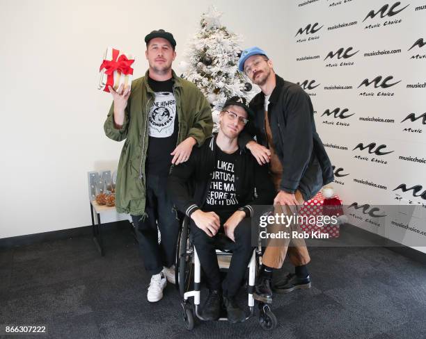 Members of Portugal. The Man Zachary Scott Crothers, Eric Howk and John Gurley visit at Music Choice on October 25, 2017 in New York City.