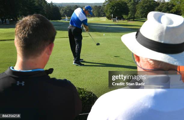 Woody Austin plays a tee shot on the first tee during the first round of the PGA TOUR Champions Dominion Energy Charity Classic at The Country Club...