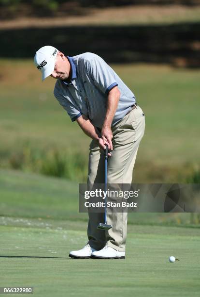 Kevin Sutherland hits a putt during the first round of the PGA TOUR Champions Dominion Energy Charity Classic at The Country Club of Virginia on...