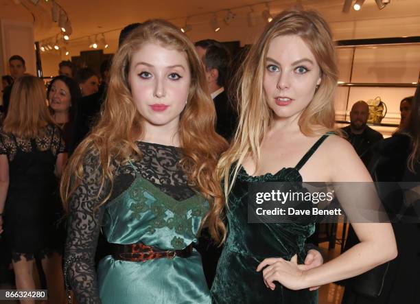 Bebe Cave and Nell Hudson attend the Burberry BAFTA Breakthrough Brits 2017 at the global Burberry flagship on October 25, 2017 in London, England.