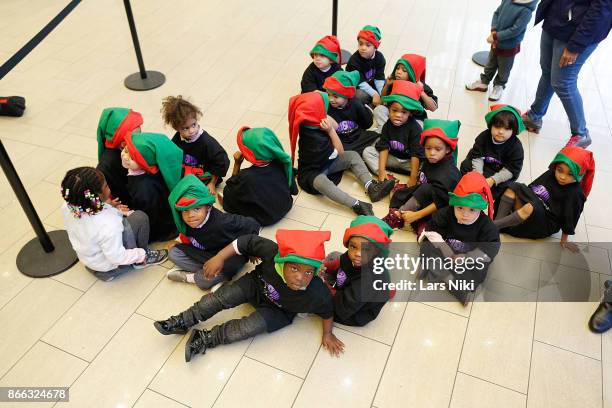 Members of the Garden of Dreams Foundation attend the unveiling of The Big Apple's Biggest Rice Krispies Sculpture celebrating Elf The Musical...