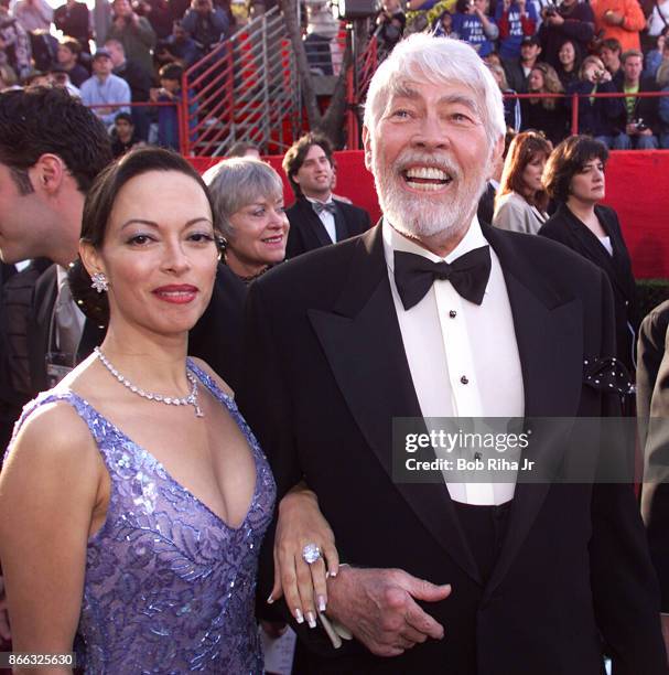 Actor James Coburn and Paula Coburn at the 71st Annual Academy Awards, March 21,1999 In Los Angeles, California.