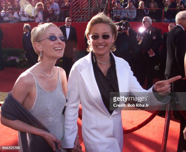 Comedian Ellen DeGeneres and Actor Anne Heche at the 71st Annual Academy Awards, March 21,1999 In Los Angeles, California.