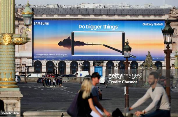 Giant advertisement for the new Samsung Galaxy Note 8 phone is displayed on 'Place de la Concorde' on October 25, 2017 in Paris, France. The new...
