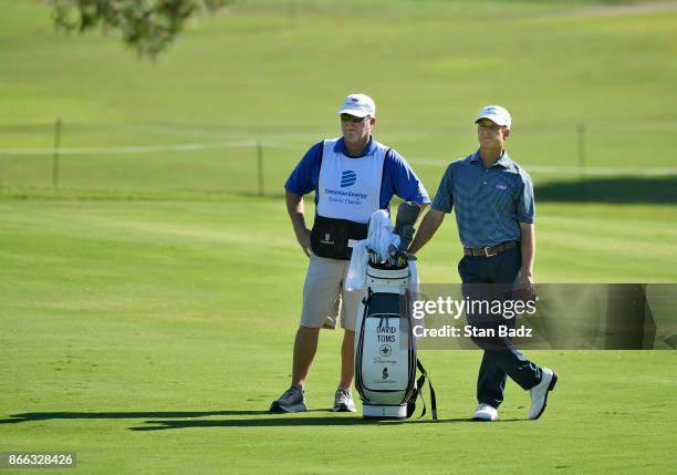 David Toms watches play on the 18th hole during the first round of the PGA TOUR Champions Dominion Energy Charity Classic at The Country Club of...