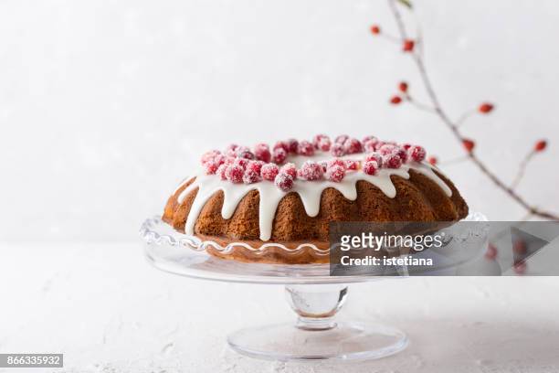 candied cranberries bundt cake - cake table stock pictures, royalty-free photos & images