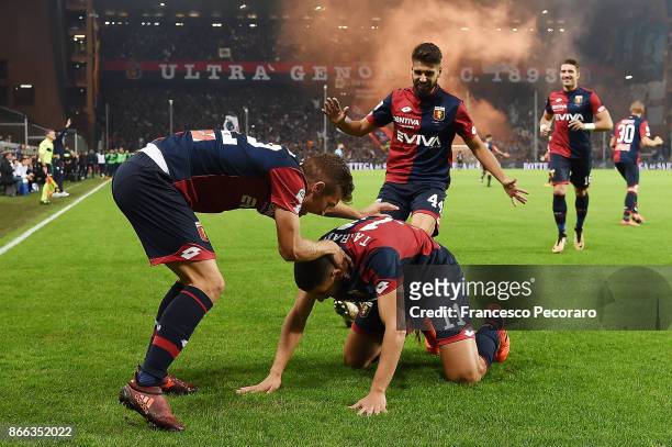 Darko Lazovic, Miguel Veloso and Adel Taarabt of Genoa CFC celebrate the 1-0 goal scored by Adel Taarabt during the Serie A match between Genoa CFC...