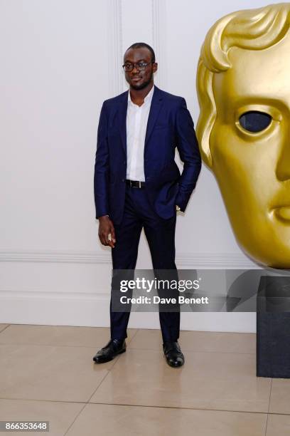 Segun Akinola attends the Burberry BAFTA Breakthrough Brits 2017 at the global Burberry flagship, 121 Regent Street, on October 25, 2017 in London,...