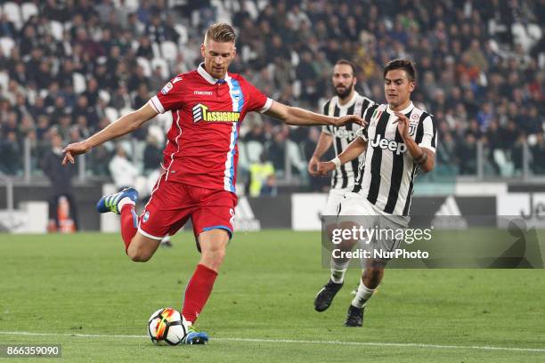 Defender Bartosz Salamon in action against Juventus forward Paulo Dybala during the Serie A football match n.10 JUVENTUS - SPAL on at the Allianz...