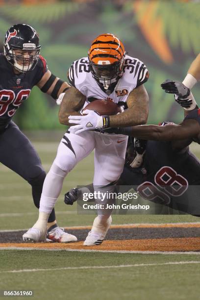 Jeremy Hill of the Cincinnati Bengals runs the football upfield during the game against the Houston Texans at Paul Brown Stadium on September 14,...