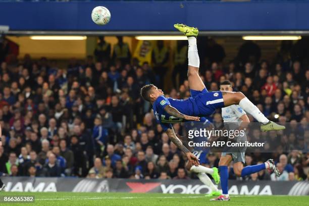 Chelsea's Brazilian striker Kenedy clears the ball during the English League Cup fourth round football match between Chelsea and Everton at Stamford...