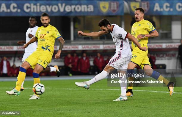 Hakan Calhanoglu of AC Milan scores the 0-3 goal during the Serie A match between AC Chievo Verona and AC Milan at Stadio Marc'Antonio Bentegodi on...