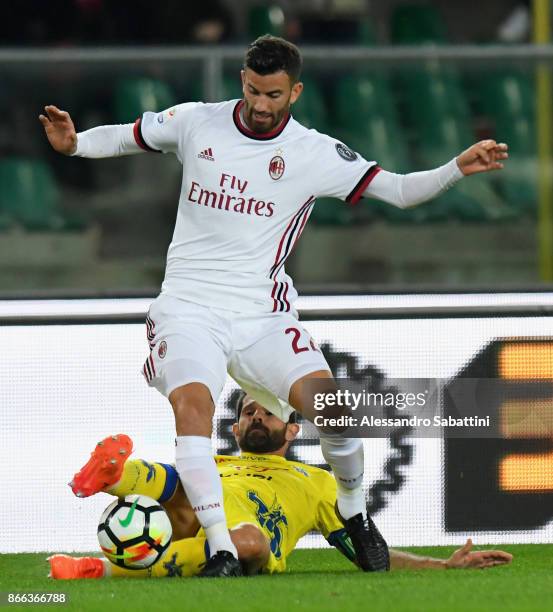 Mateo Musacchio of AC Milan competes for the ball whit Sergio Pellissier AC Chievo Verona during the Serie A match between AC Chievo Verona and AC...