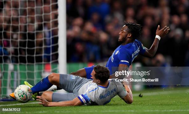 Michy Batshuayi of Chelsea is tackled by Phil Jagielka of Everton during the Carabao Cup Fourth Round match between Chelsea and Everton at Stamford...