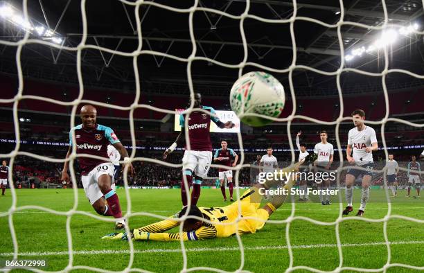 West Ham striker Andre Ayew scores the first West Ham goal past Michel Vorm during the Carabao Cup Fourth Round match between Tottenham Hotspur and...