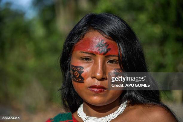 Portrait of Sykyry Waiapi in the Waiapi indigenous reserve in Amapa state in Brazil on October 14, 2017. The tiny Waiapi tribe is resisting moves by...
