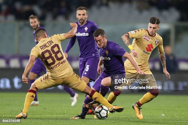 Valentin Eysseric of ACF Fiorentina battles for the ball with Thomas Rincon of Torino Fc during the Serie A match between ACF Fiorentina and Torino...
