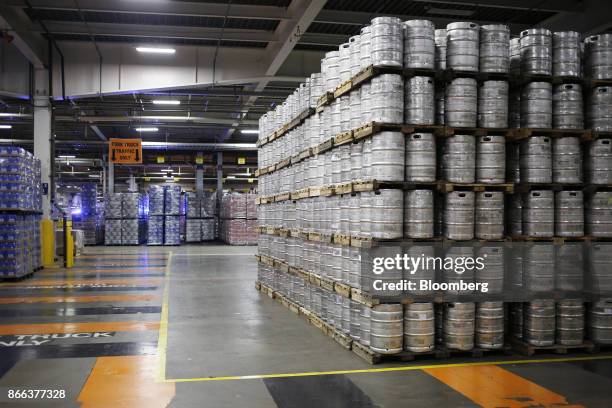 Kegs of beer sit stacked in a shipping warehouse at the Anheuser-Busch InBev NV Budweiser brewery in St. Louis, Missouri, U.S., on Tuesday, Oct. 24,...