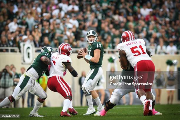 Spartans quarterback Brian Lewerke surveys the field during a Big Ten Conference NCAA football game between Michigan State and Indiana on October 21...