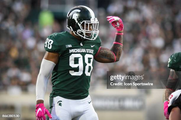 Spartans defensive end Demetrius Cooper makes a signal during a Big Ten Conference NCAA football game between Michigan State and Indiana on October...