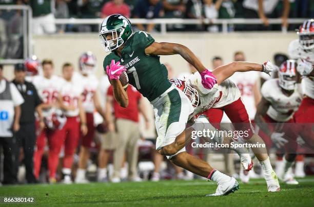 Spartans wide receiver Cody White picks up a big gain on third down during a Big Ten Conference NCAA football game between Michigan State and Indiana...