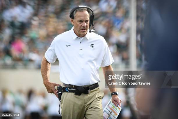 Spartans head coach Mark Dantonio paces the sideline during a Big Ten Conference NCAA football game between Michigan State and Indiana on October 21...