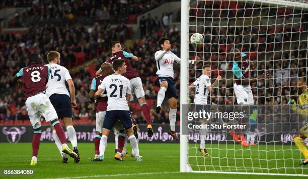 Angelo Ogbonna of West Ham United scores his side's third goal during the Carabao Cup Fourth Round match between Tottenham Hotspur and West Ham...