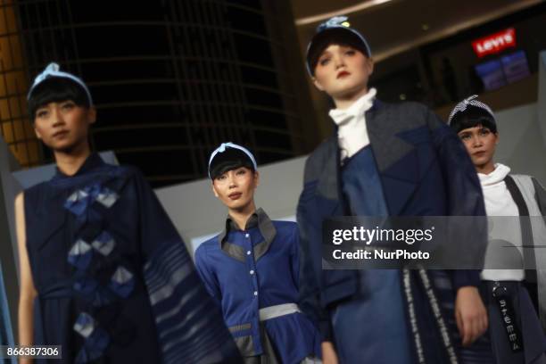 Models present creation from STEMMA collection during Jakarta Fashion Week 2018 at Senayan City, Jakarta on Wednesday 25, 2017. Jakarta Fashion Week...