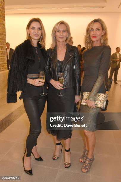 Susanna Abu Zalaf, Tia Graham and Marie Moatti attend the Cerruti 1881 50th anniversary film premiere at The Serpentine Sackler Gallery on October...