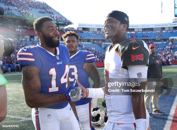 Jameis Winston of the Tampa Bay Buccaneers shakes hands with Joe Webb of the Buffalo Bills after their NFL game at New Era Field on October 22, 2017...