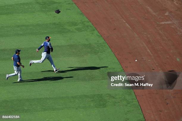 Juan Centeno and Francisco Liriano of the Houston Astros warm up prior to game two of the 2017 World Series against the Los Angeles Dodgers at Dodger...