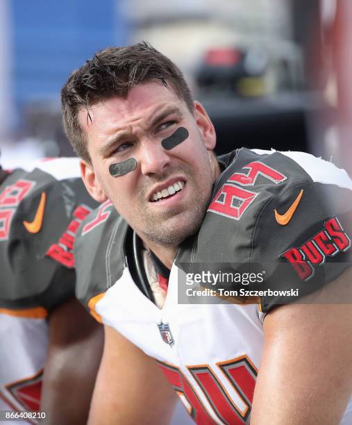 Cameron Brate of the Tampa Bay Buccaneers looks on from the bench during NFL game action against the Buffalo Bills at New Era Field on October 22,...