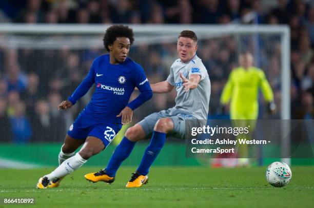 Chelsea's Willian holds off the challenge from Everton's James McCarthy during the Carabao Cup Fourth Round match between Chelsea and Everton at...