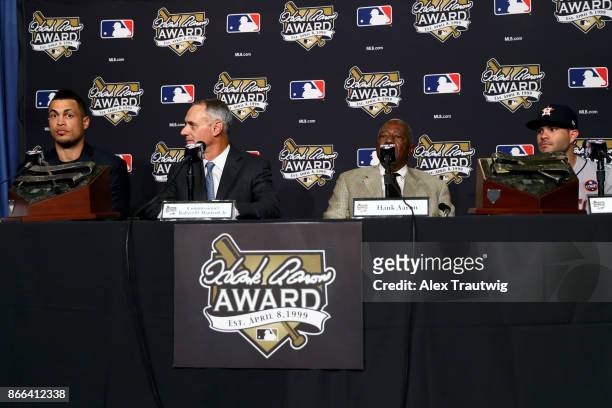 Giancarlo Stanton of the Miami Marlins, Major League Baseball Commissioner Robert D. Manfred Jr., Hall of Famer Hank Aaron and Jose Altuve of the...