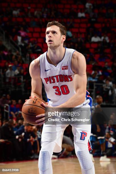 Jon Leuer of the Detroit Pistons shoots the ball against the Minnesota Timberwolves on October 25, 2017 at Little Caesars Arena in Detroit, Michigan....