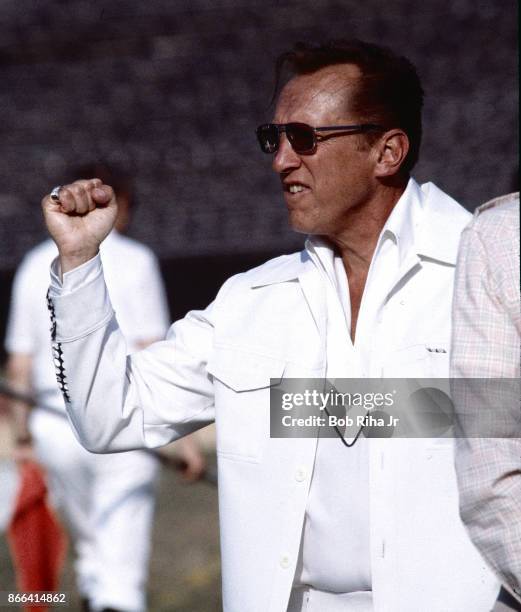 Los Angeles Raiders Owner Al Davis cheers from the sidelines during San Francisco 49'ers game against Los Angeles Raiders, August 6, 1983 in Los...