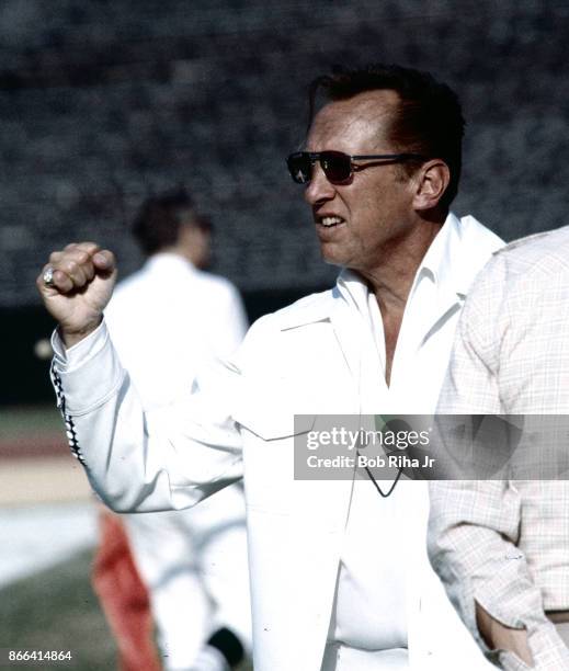 Los Angeles Raiders Owner Al Davis cheers from the sidelines during San Francisco 49'ers game against Los Angeles Raiders, August 6, 1983 in Los...