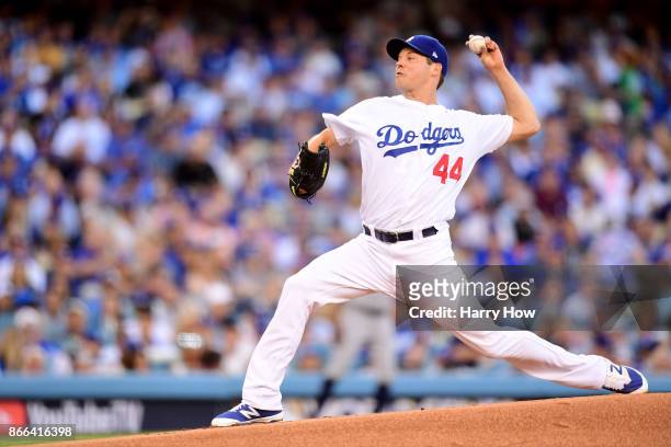 Rich Hill of the Los Angeles Dodgers throws a pitch during the first inning against the Houston Astros in game two of the 2017 World Series at Dodger...