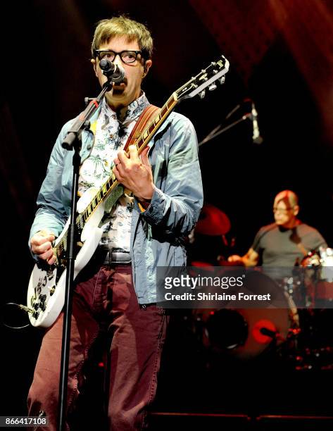 Rivers Cuomo and Patrick Wilson of Weezer perform live on stage at O2 Apollo Manchester on October 25, 2017 in Manchester, England.