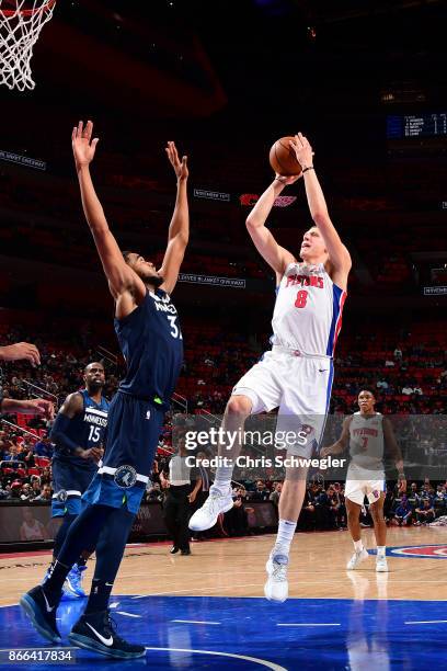 Henry Ellenson of the Detroit Pistons shoots the ball against the Minnesota Timberwolves on October 25, 2017 at Little Caesars Arena in Detroit,...