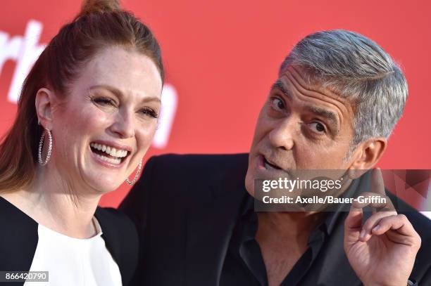 Actress Julianne Moore and director George Clooney arrive at the premiere of Paramount Pictures' 'Suburbicon' at Regency Village Theatre on October...