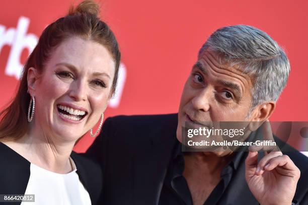 Actress Julianne Moore and director George Clooney arrive at the premiere of Paramount Pictures' 'Suburbicon' at Regency Village Theatre on October...