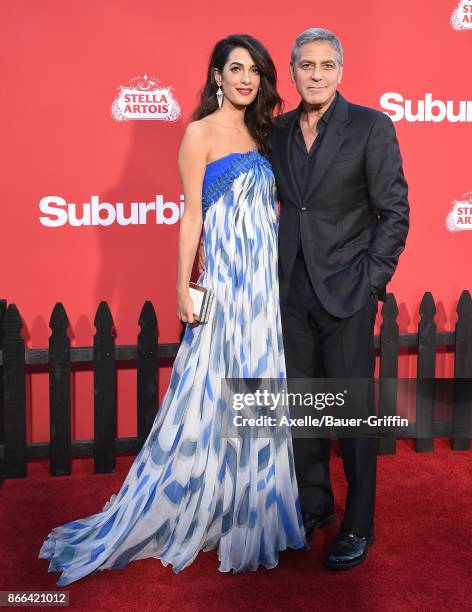 Director George Clooney and wife Amal Clooney arrive at the premiere of Paramount Pictures' 'Suburbicon' at Regency Village Theatre on October 22,...