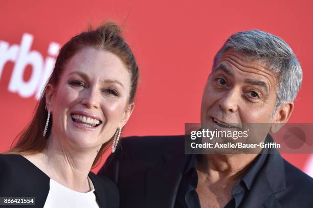 Actress Julianne Moore and director George Clooney arrive at the premiere of Paramount Pictures' 'Suburbicon' at Regency Village Theatre on October...