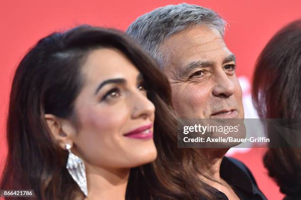 Director George Clooney and wife Amal Clooney arrive at the premiere of Paramount Pictures' 'Suburbicon' at Regency Village Theatre on October 22,...